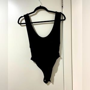 Missguided Black low cut bodysuit size 6